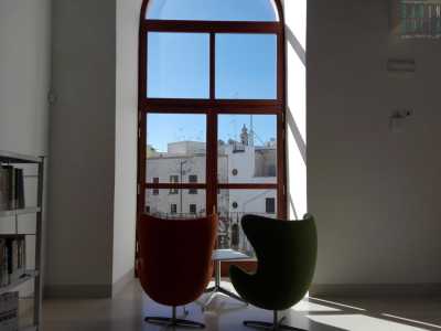 ...un modo come un altro per gustarsi un romanzo e ammirare di tanto in tanto il magnifico panorama del borgo antico